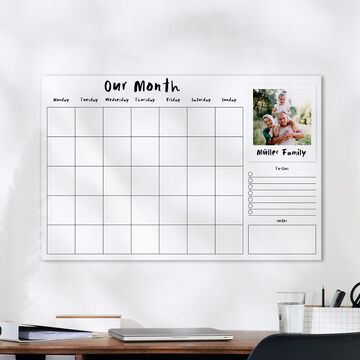Wall calendar with space for a family photo and empty weekly boxes