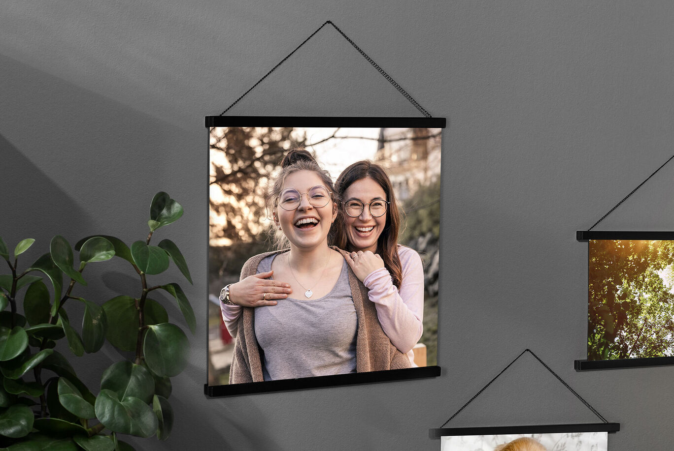 Two women posing together in a beautiful outdoor setting.