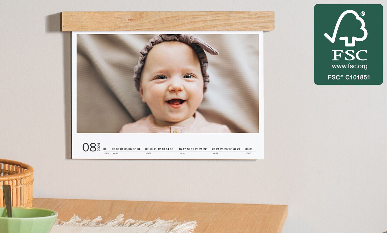 A calendar featuring a cute, personalized image in a modern room radiating coziness