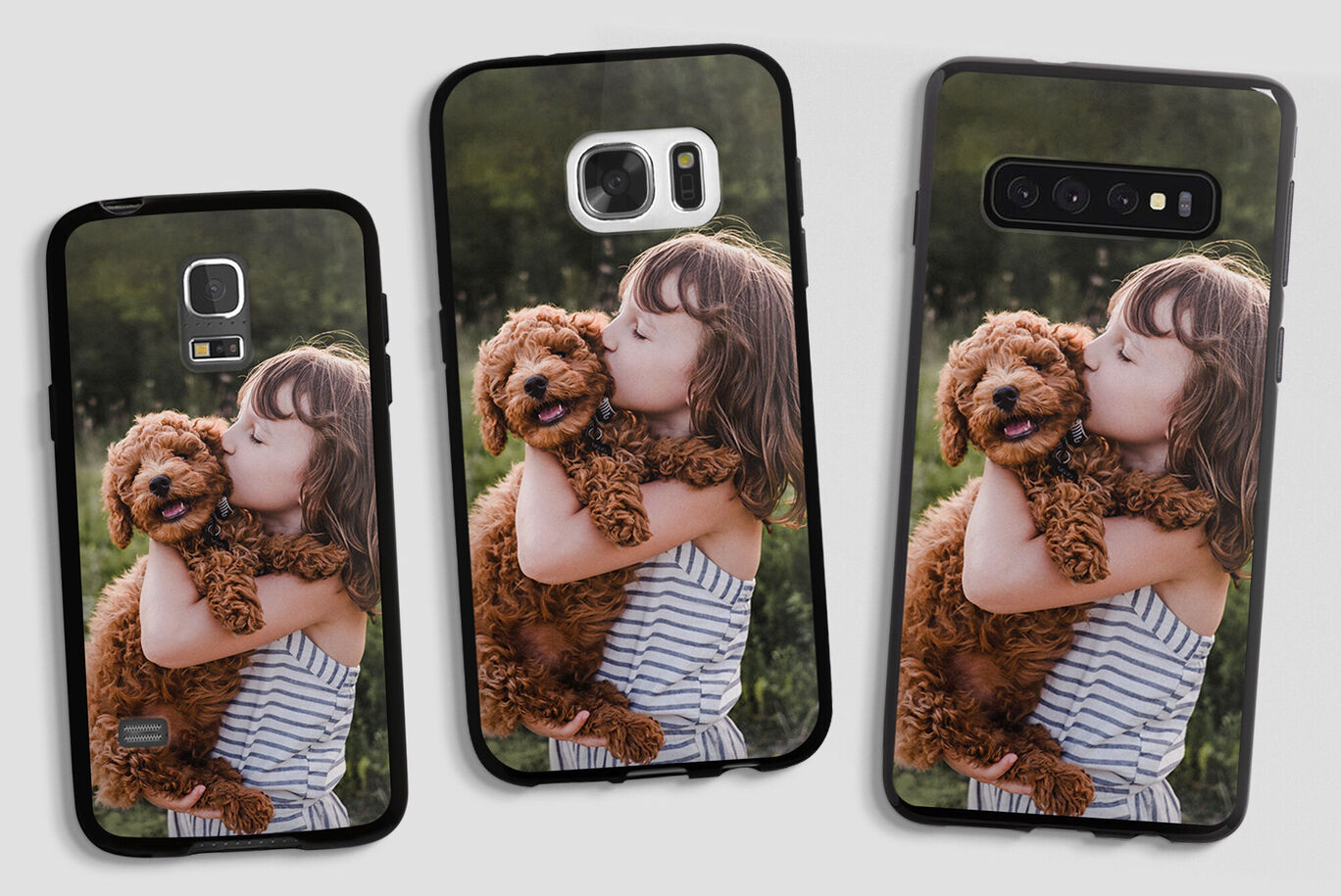 Three phone cases with a photo of a girl hugging a dog