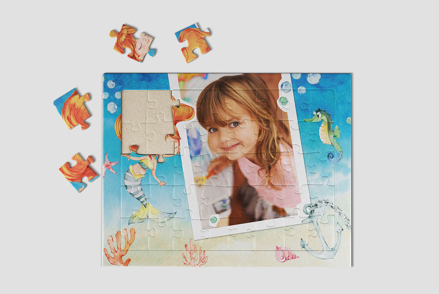 Colorfully designed puzzle with various maritime motifs and an empty photo cutout