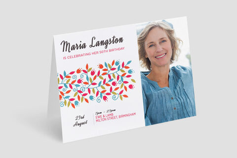 Inviting greeting card for a 50th birthday with colorful floral design and the name Maria Langston