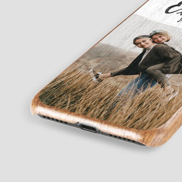 Phone case featuring a photo of a person in tall grass.