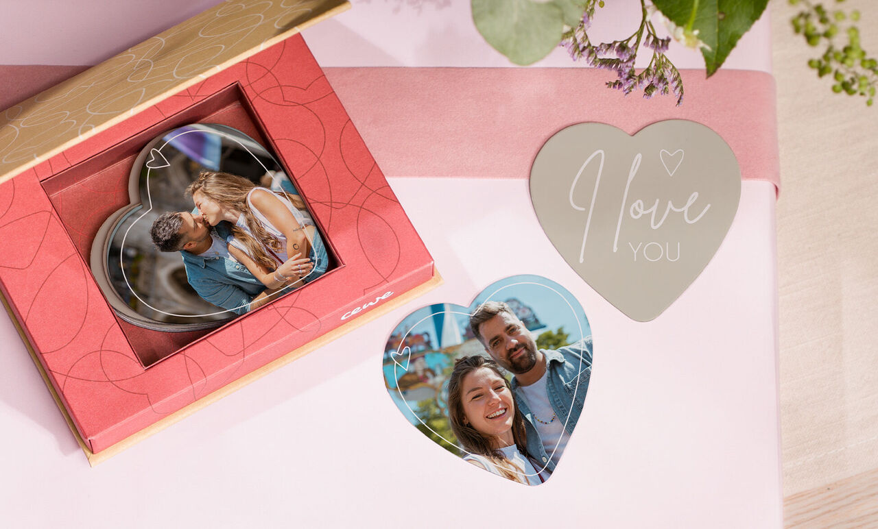 Heart-shaped photos in a lovingly wrapped gift.