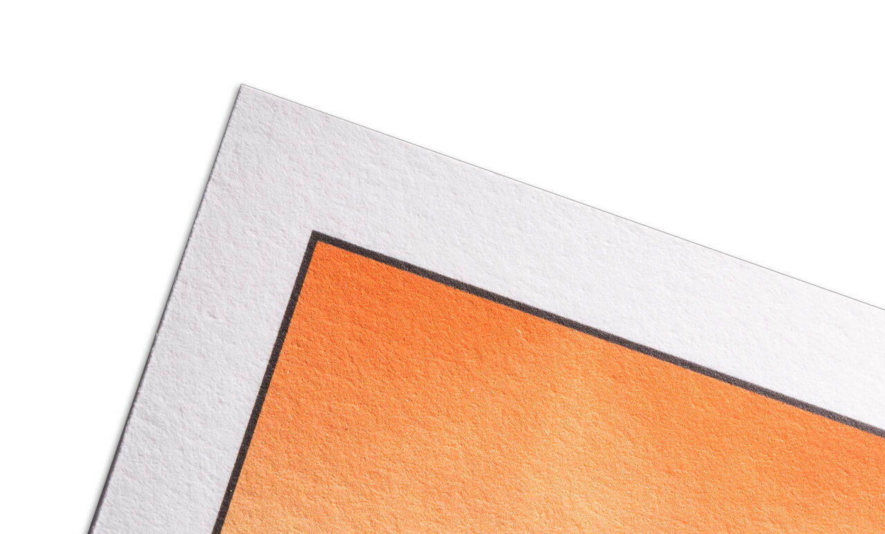 Corner view of a piece of art with warm orange tones