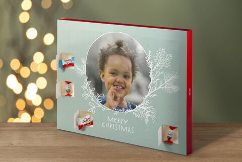 An advent calendar with Christmas motifs and sweets.
