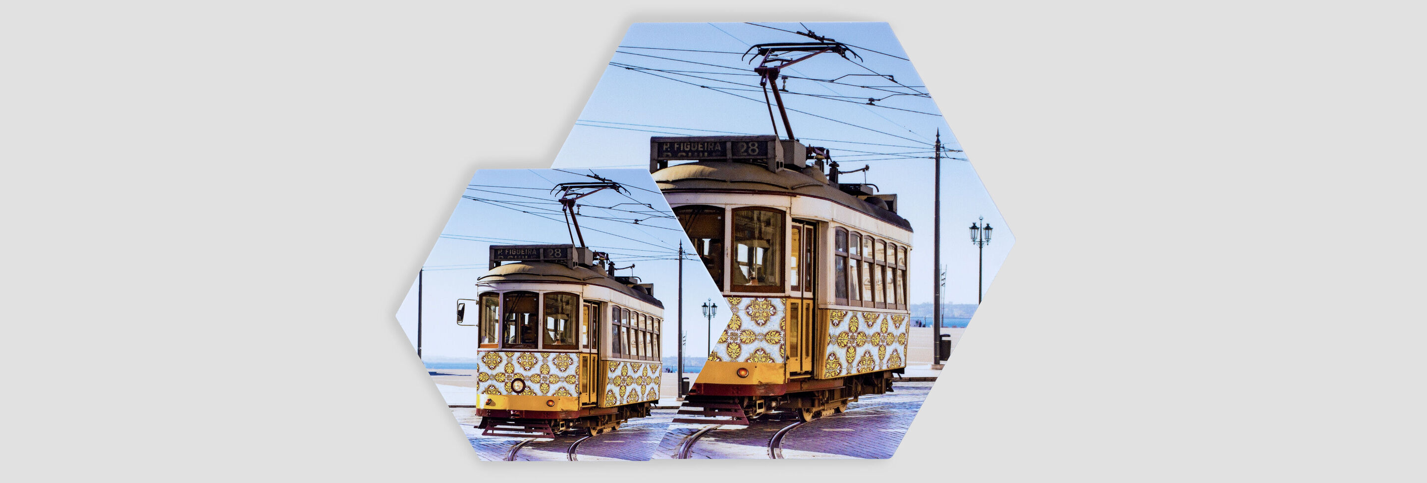 Colorful tram with nostalgic design on a track.