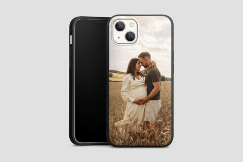 Phone case with a couple in a field at sunset