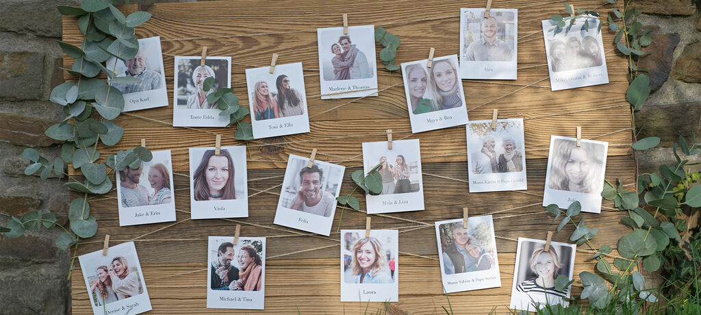 Creative photo wall with memory photos from friends and family