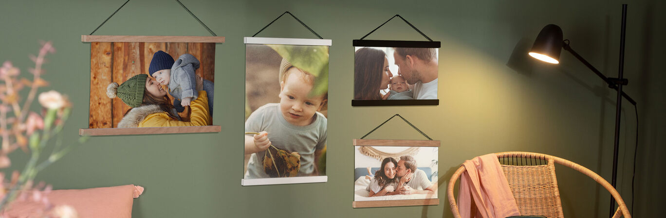 Four lovingly designed photos on the wall showing personal memories.