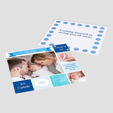 A lovely photo book with baby photos and a card featuring a blue design
