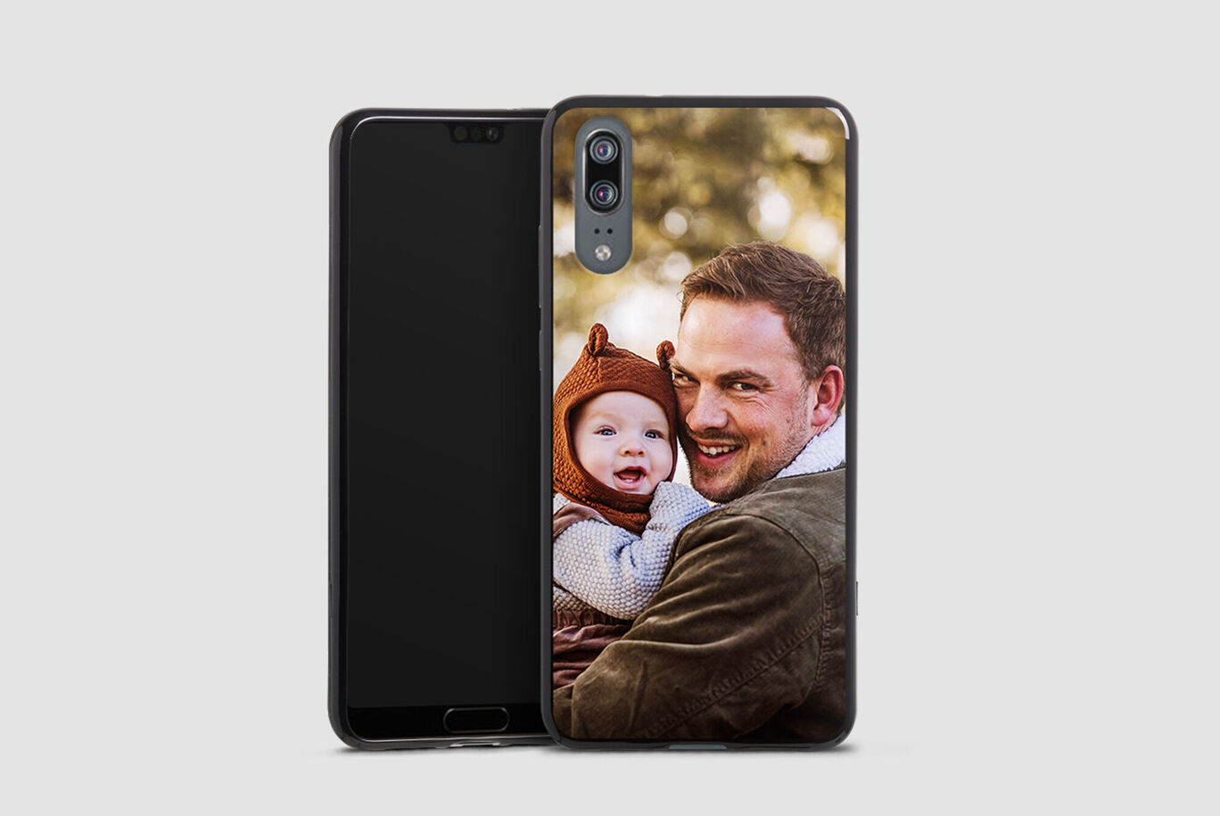 Smiling father with child in nature