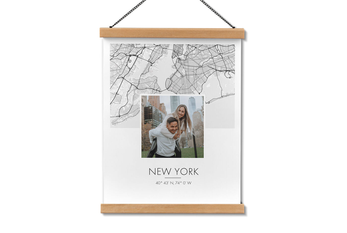Loving couple posing in front of a map of New York City.