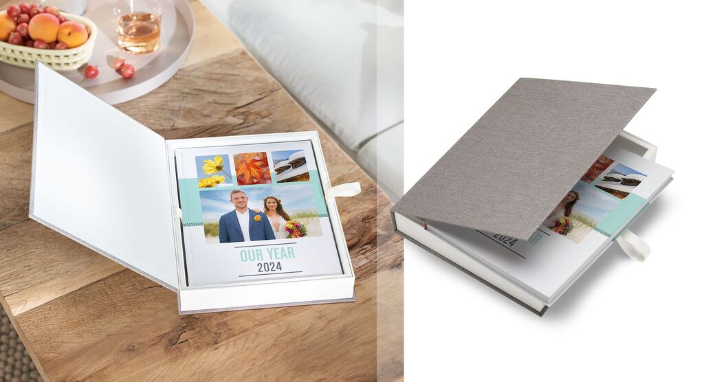 CEWE PHOTO BOOK in an open box with personal photos.