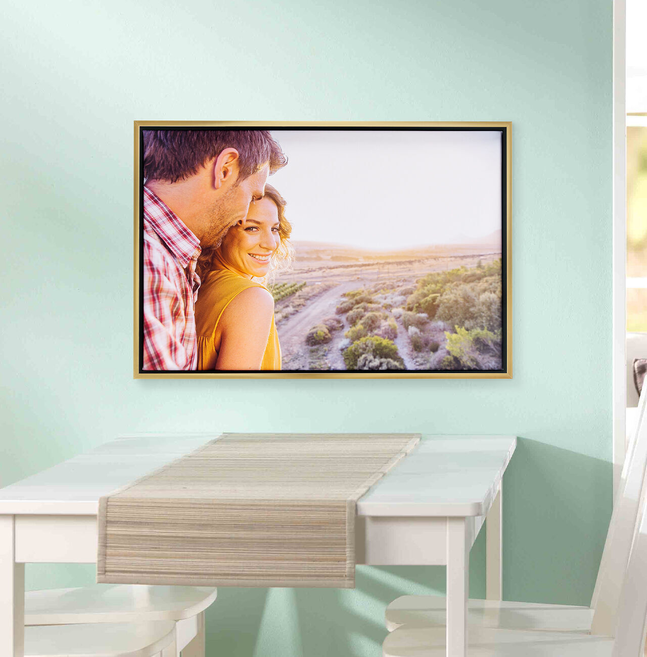 A beautiful snapshot of a couple looking together at a landscape. They enjoy the sunset surrounded by greenery.