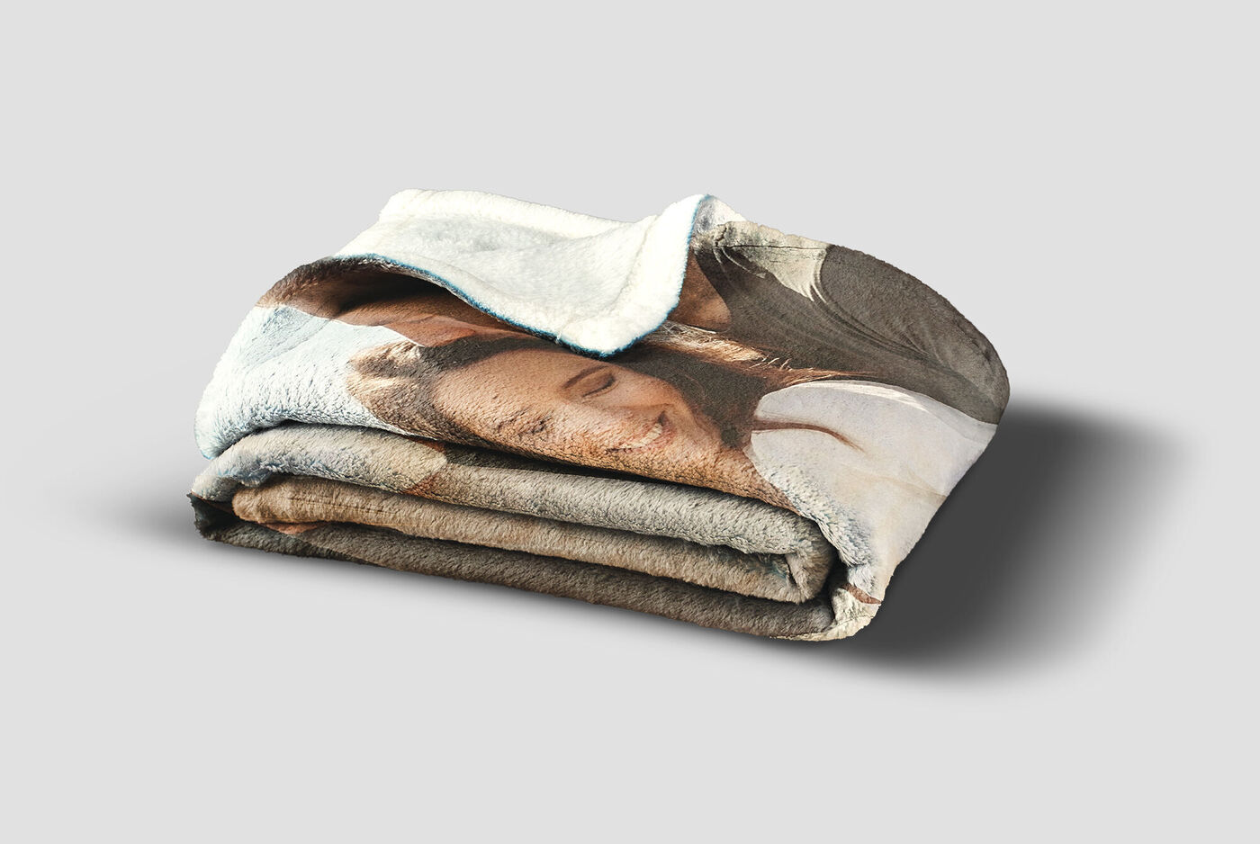 A lovingly designed fleece featuring a photo of a couple hugging and smiling on the front