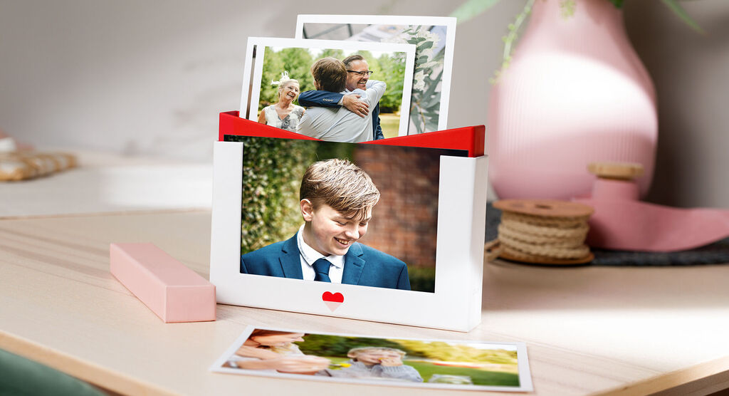 A lovely photo product with multiple joyful pictures, beautifully arranged on a table.