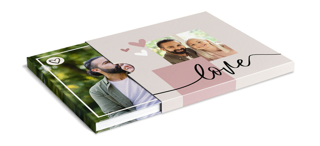 Two CEWE PHOTO BOOKS with a romantic design and photos of happy couples on the cover.