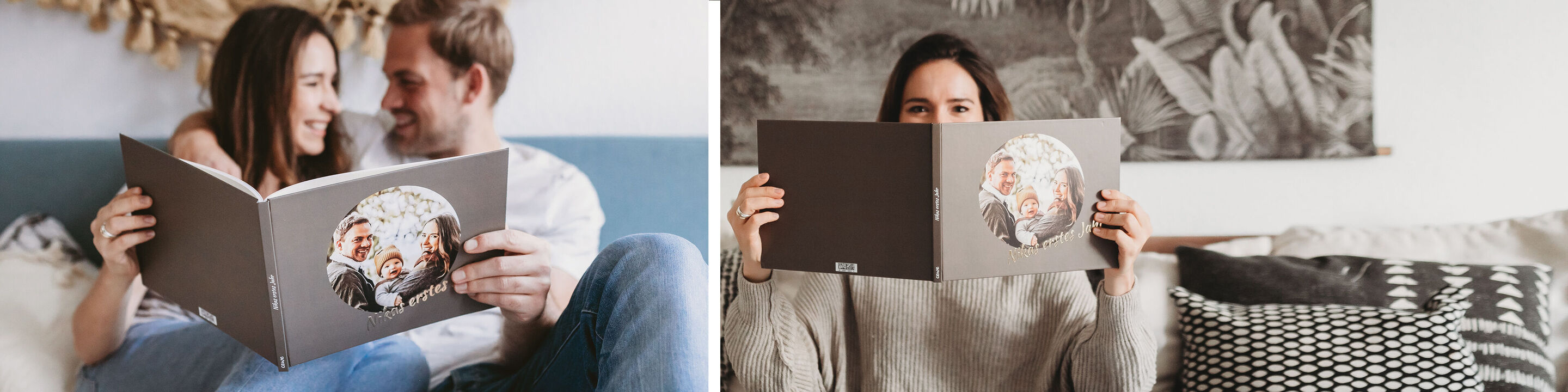 Two people hold a CEWE photo book and look at it with joy.