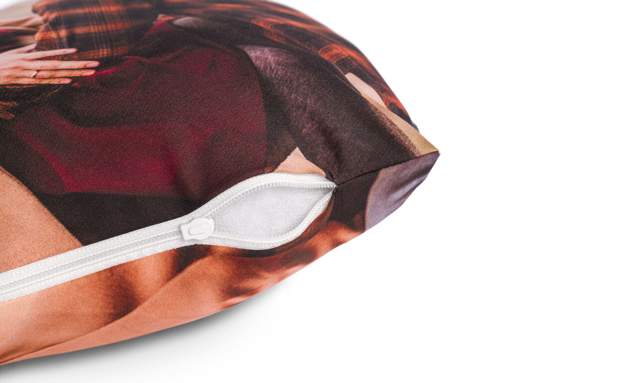Close-up of a personalized pillow with a zipper.