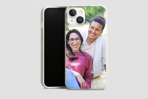 People with smartphone on a meadow, joyful break outdoors
