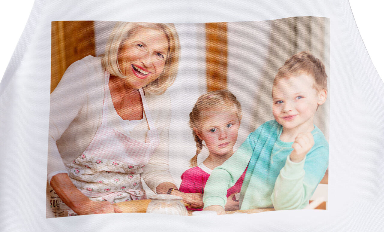 A heartwarming moment of a woman baking with two children.