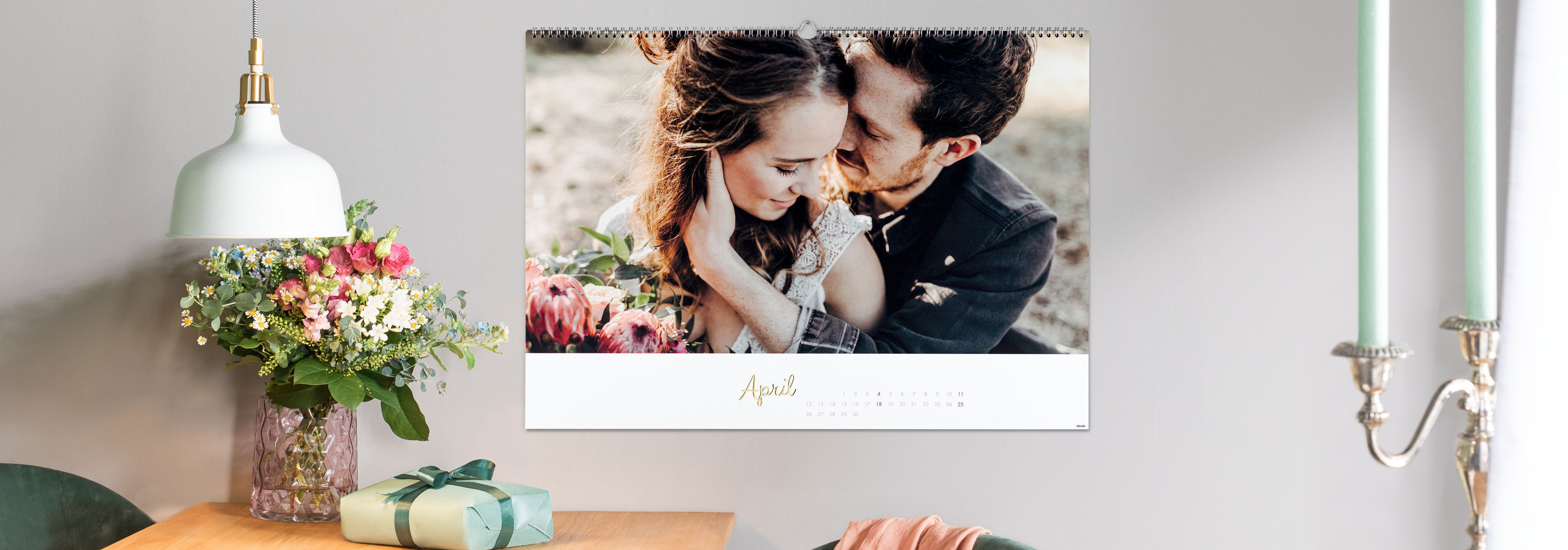 Creative wall picture of a couple in romantic embrace with floral accents
