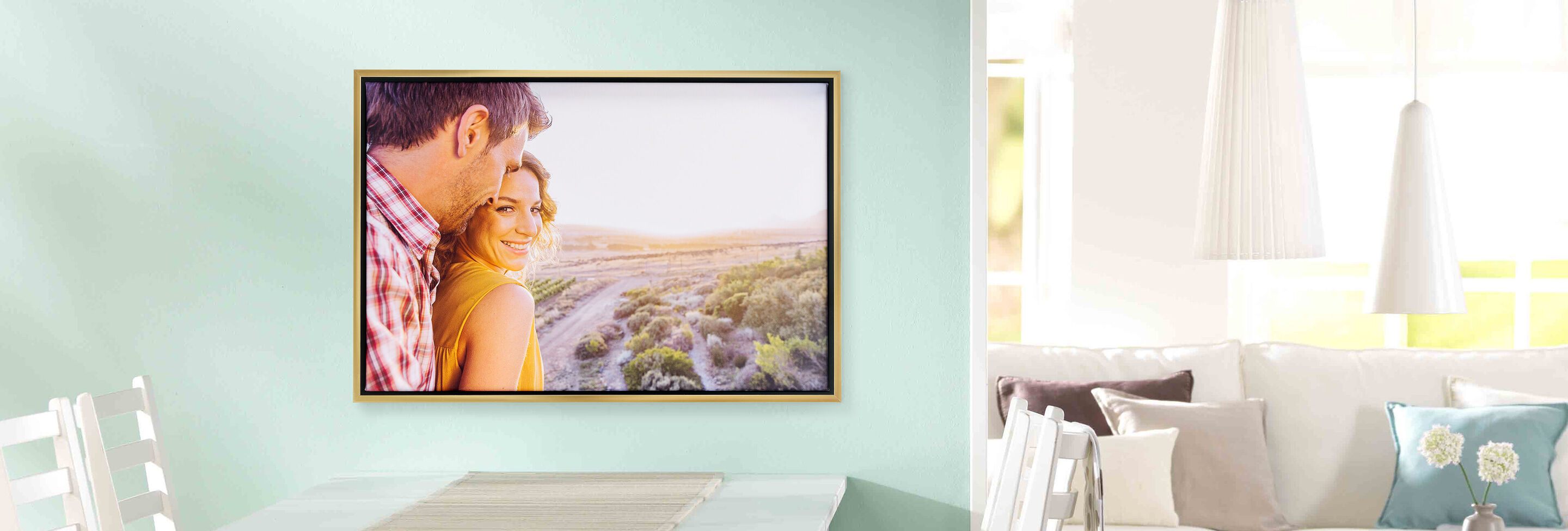 A beautiful wall picture of a couple looking into the distance, framed in a modern room.