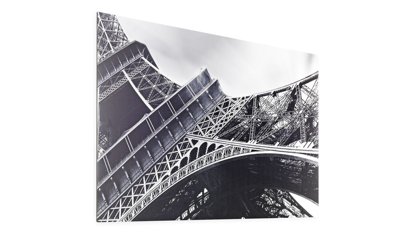 Black-and-white image of the Eiffel Tower showing the structure and arches