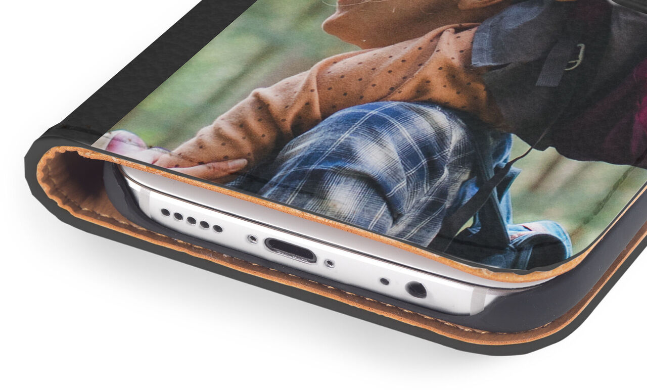Close-up of a handmade phone case design with a personalized photo.