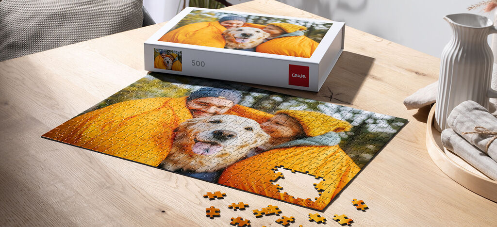 Puzzle game with animals and people in yellow jackets on a table