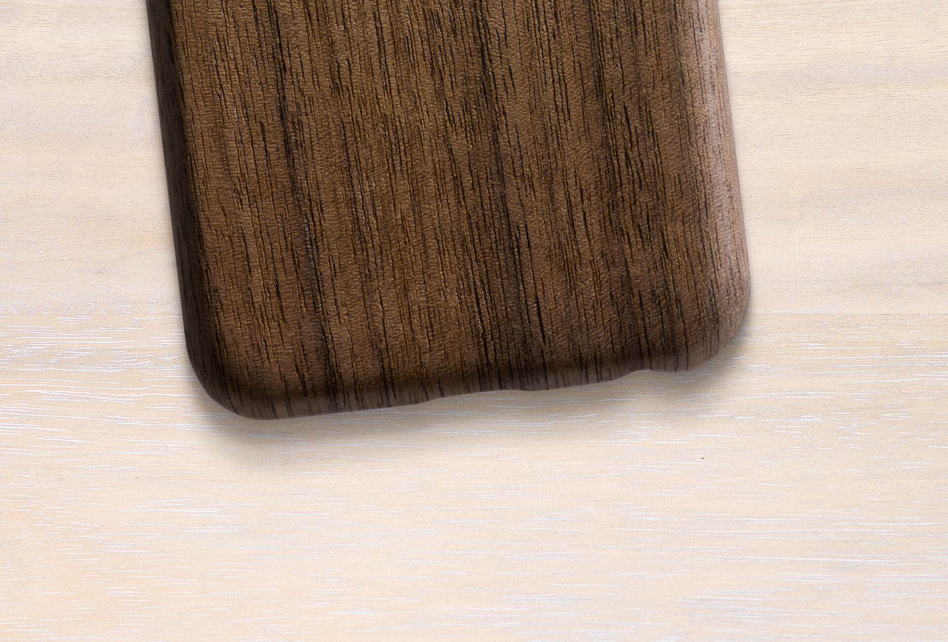 Wooden phone case on a light background