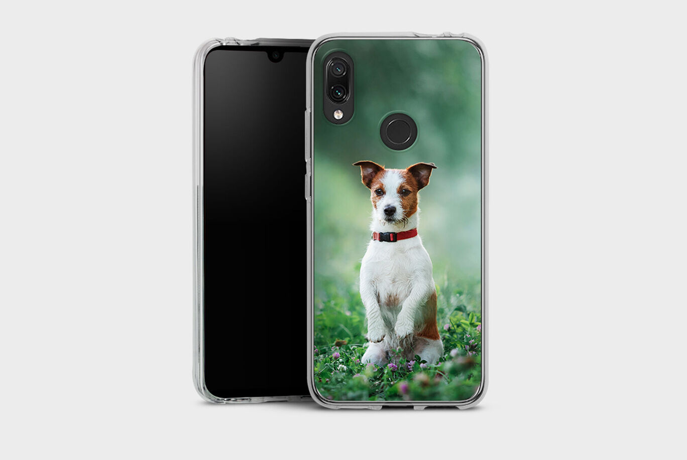 A clear phone case with a cute dog sitting on a meadow, surrounded by colorful flowers.