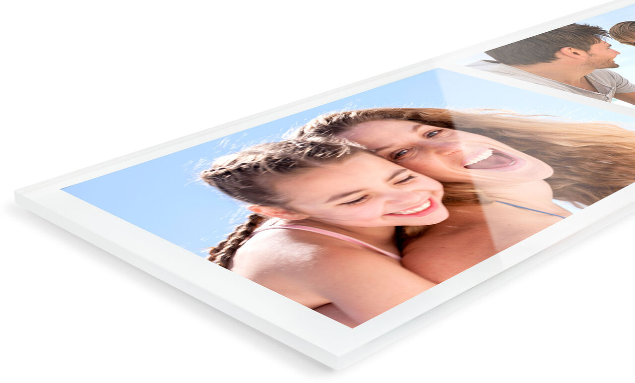 A woman and a girl with joyful faces hugging happily under a blue sky. A warming moment full of happiness and affection.