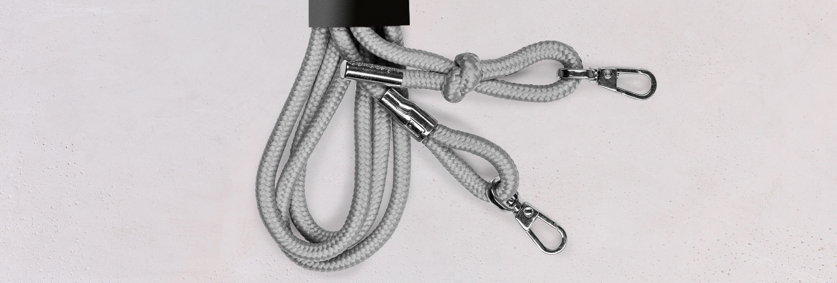 Gray combined leashes with two carabiners for practical use