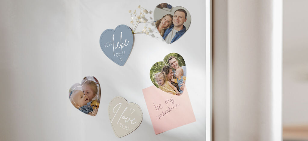 Heartfelt photo motifs on a glass surface, including a note that reads 'be my valentine'