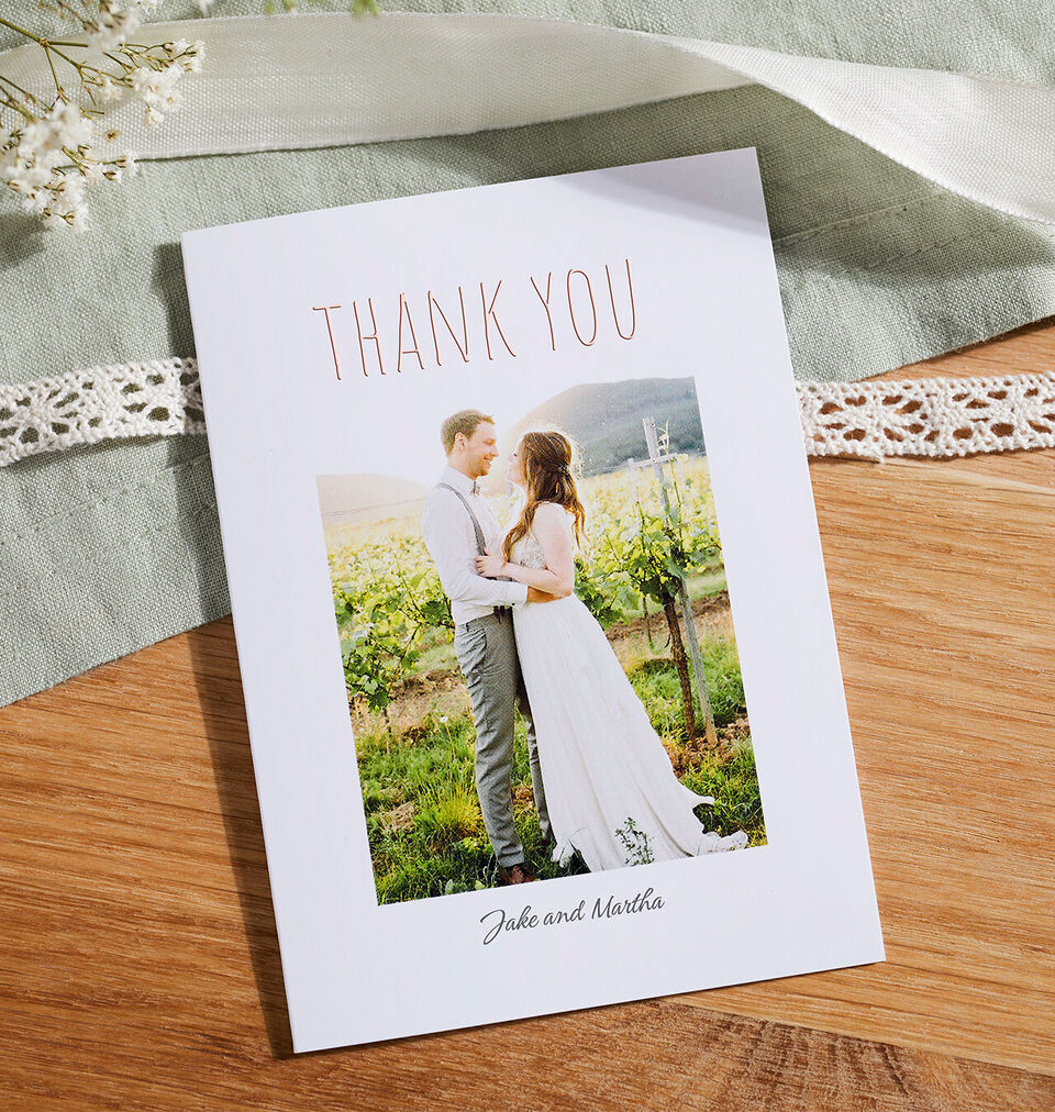 Wedding thank-you card from Jake and Martha with photo and thank-you text.