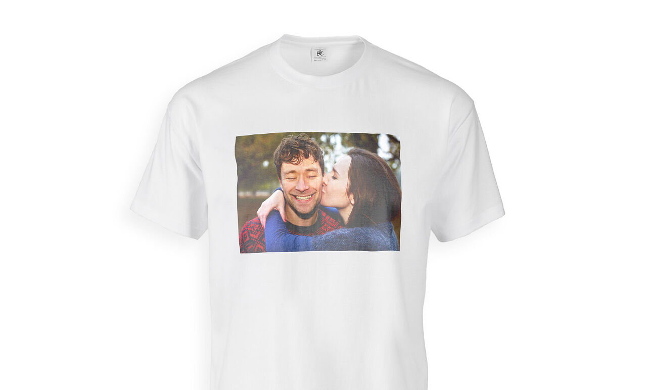 A t-shirt featuring a happy photo of a couple embracing on the front