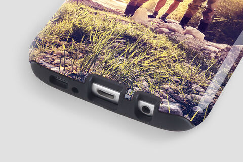 Close-up of a personalized phone case with a nature motif.