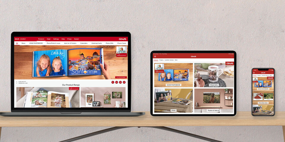 Representation of the CEWE website on laptop, tablet, and smartphone
