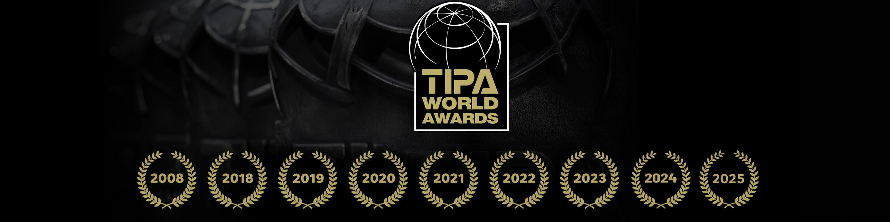 Award ceremony with golden laurel wreaths for the TIPA WORLD AWARDS from 2008 to 2025.