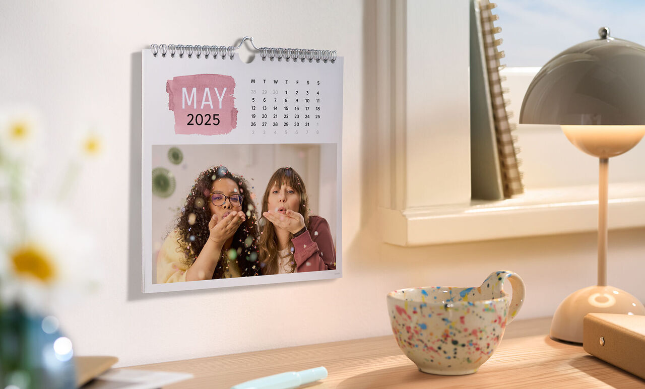Wonderful wall calendar with lovely photos for May 2025