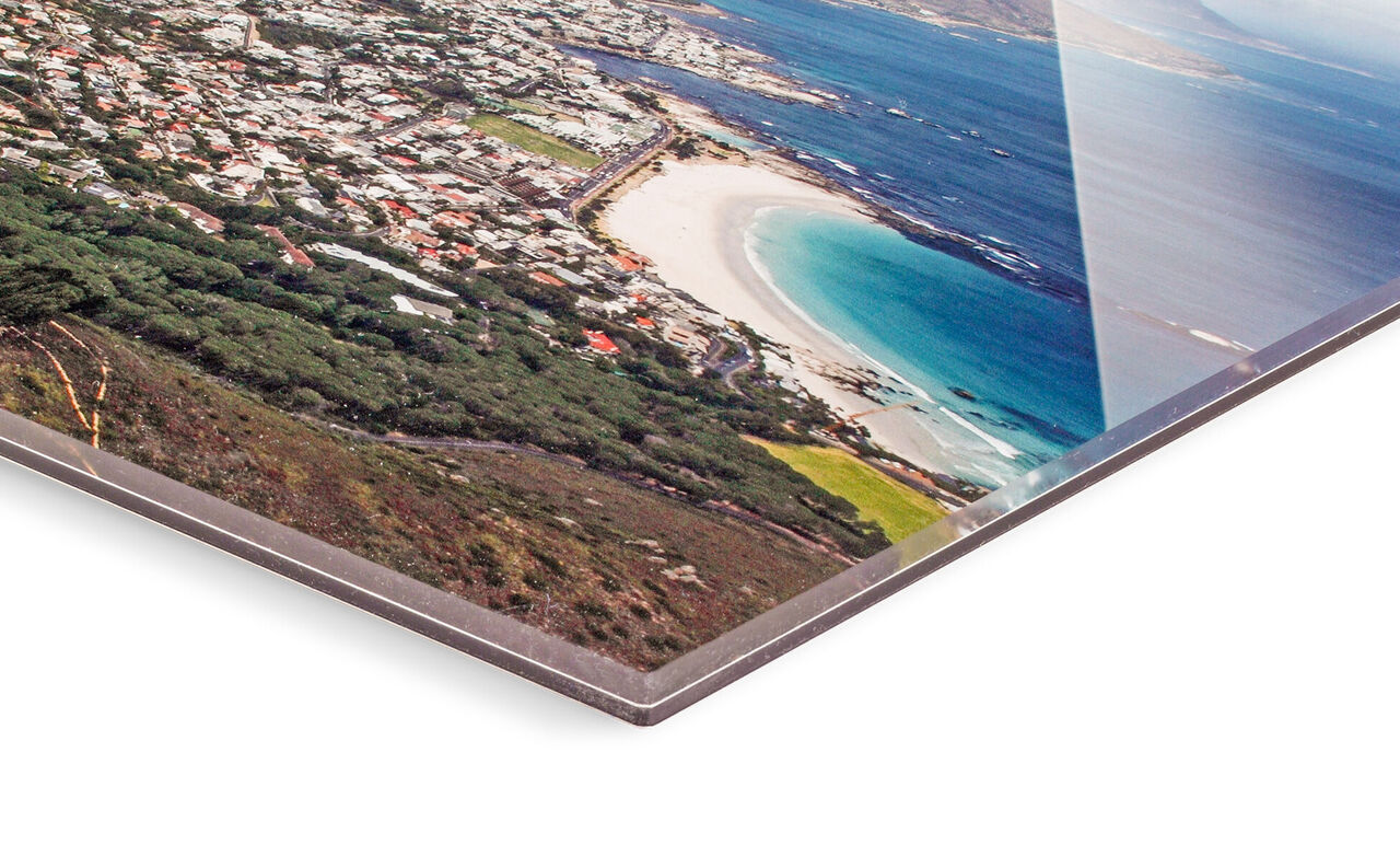 Close-up of a CEWE mural with a coastal landscape in the corner.