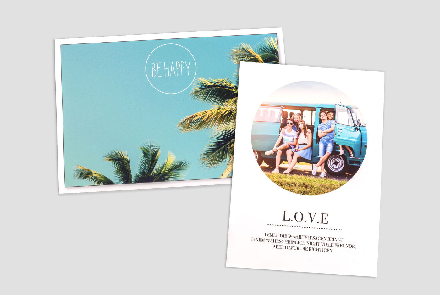 Postcard with the text 'Be Happy' and a photo of three people relaxing next to a blue van, surrounded by palm trees.