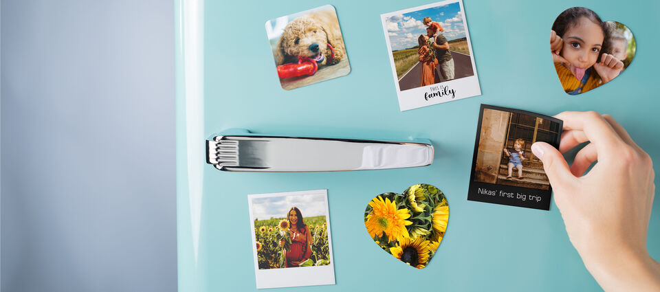 Colorful photos of happy moments on a fridge.