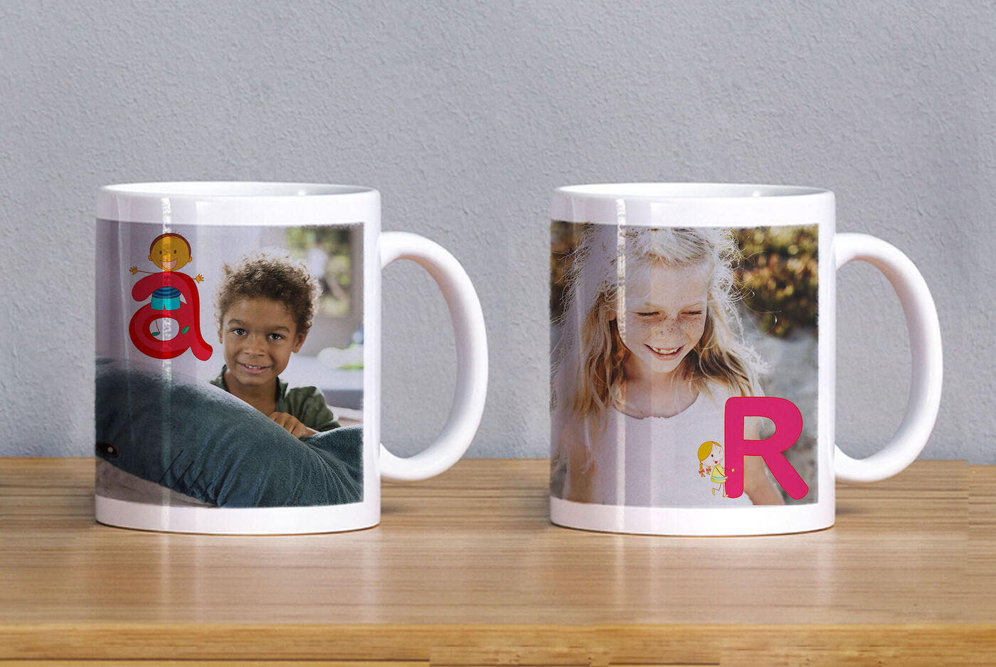 Two lovingly designed mugs with colorful letters and photos.