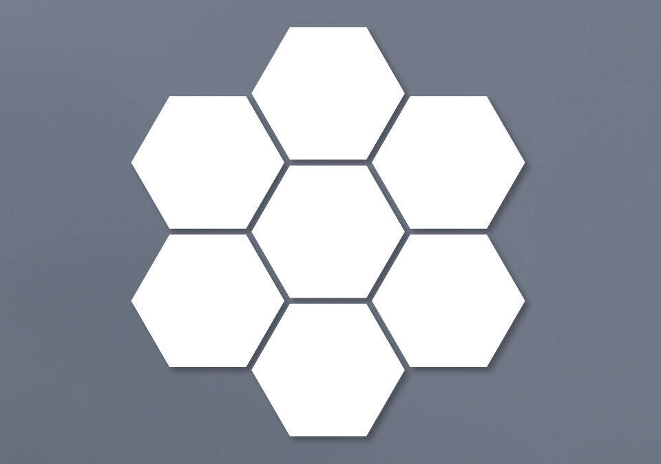 Six empty white hexagons on a gray background.