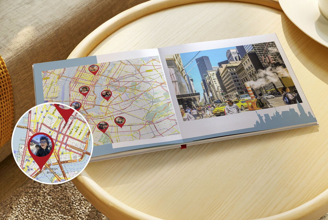 An open photo book on a table displaying urban photos and a map with markers. CEWE PHOTO BOOK is featured.