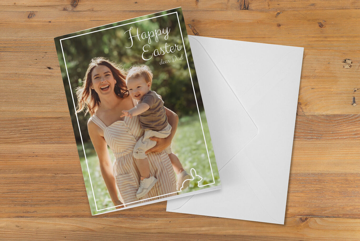 Happy Easter greeting card with blooming background