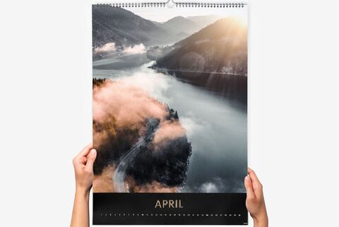 Calendar with beautiful view of a mountain lake in April.
